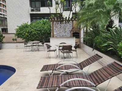 Um pátio ou outra área exterior em Flat aconchegante na Beira Mar