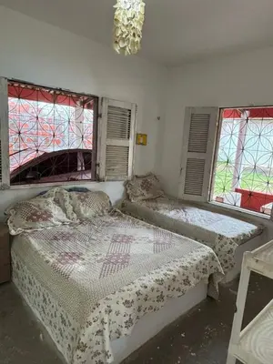Uma cama ou camas num quarto em Casa de Praia na Taiba