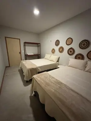 Uma cama ou camas num quarto em Casita Beach House