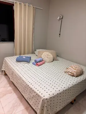 Uma cama ou camas num quarto em Casa de Eliz