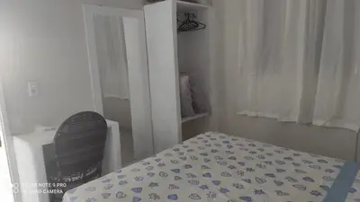 Uma cama ou camas num quarto em Apartamento em Fortaleza