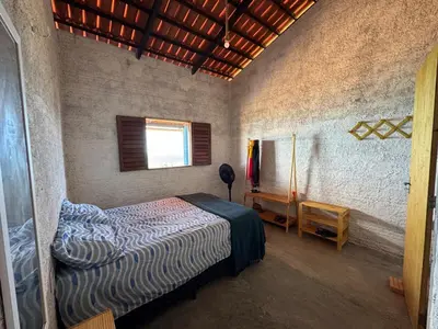 Uma cama ou camas num quarto em Casa Varanda do Mar - Icapuí