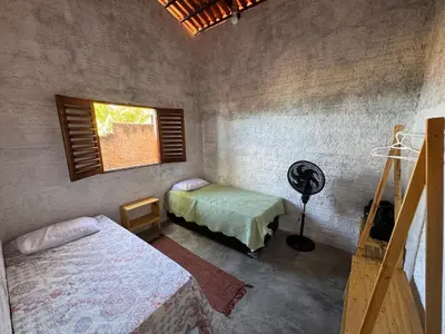 Uma cama ou camas num quarto em Casa Varanda do Mar - Icapuí