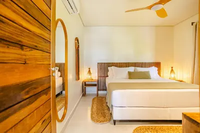 Uma cama ou camas num quarto em Aldeia Jeri Flats