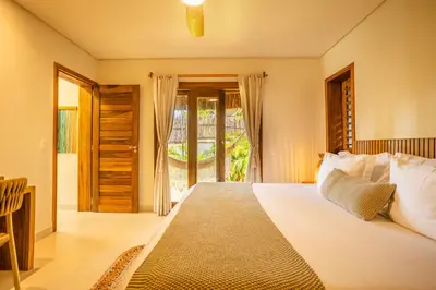 Uma cama ou camas num quarto em Aldeia Jeri Flats