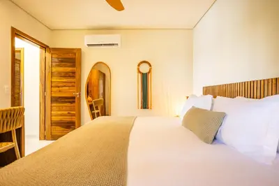 Uma cama ou camas num quarto em Aldeia Jeri Flats