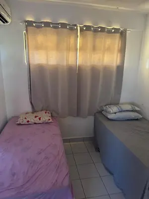 Uma cama ou camas num quarto em Apartamento 2 quartos Condomínio Vila Dunas