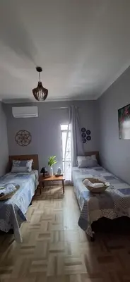 Uma cama ou camas num quarto em Seu Refúgio em Fortaleza