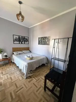 Uma cama ou camas num quarto em Seu Refúgio em Fortaleza