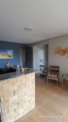 Uma área de estar em Pousada Meu Paraíso