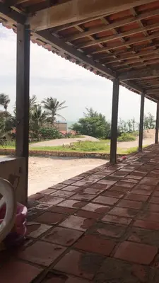 Um jardim no exterior de Casa Pitombeira