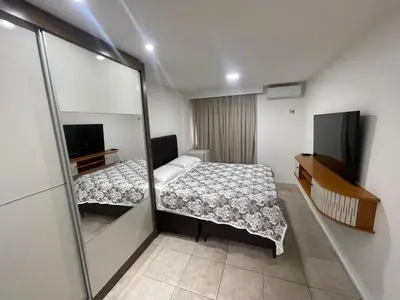 Uma cama ou camas num quarto em Flat Acolhedor e Familiar