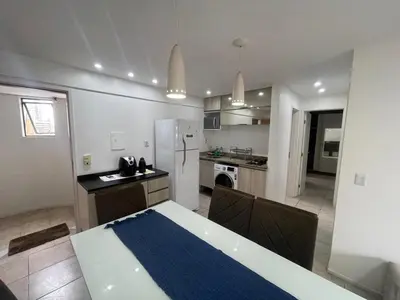A cozinha ou kitchenette de Flat Acolhedor e Familiar