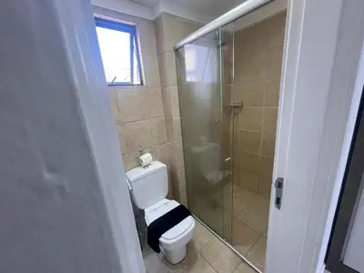 Uma casa de banho em Flat Acolhedor e Familiar