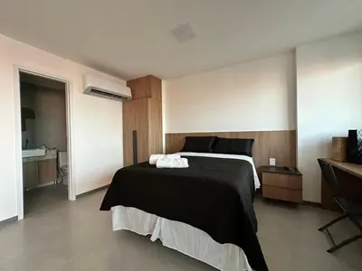 Uma cama ou camas num quarto em Beach Class Meireles - Sofisticação e Conforto