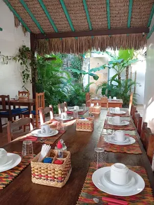 Um restaurante ou outro lugar para comer em Pousada Calamarina