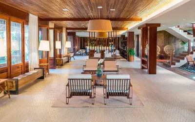 Uma área de estar em Carmel Cumbuco Resort