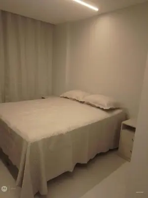 Uma cama ou camas num quarto em Apartamento beach class Meireles Vista mar