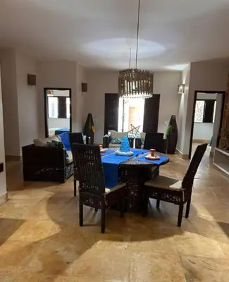 Uma área de estar em Casa de praia Águas Belas