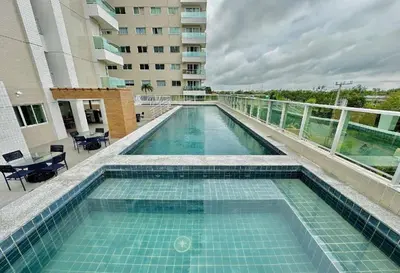 A piscina em ou perto de Ap próx ao Shopping com garagem, piscina e ar
