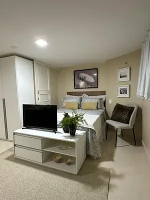 Uma televisão e/ou sistema de entretenimento em Benfica Apart Hotel