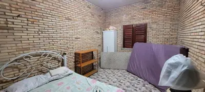 Uma cama ou camas num quarto em Casa de praia Paracuru