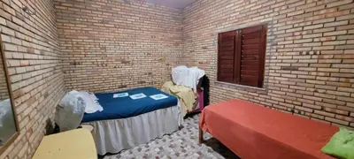 Uma cama ou camas num quarto em Casa de praia Paracuru