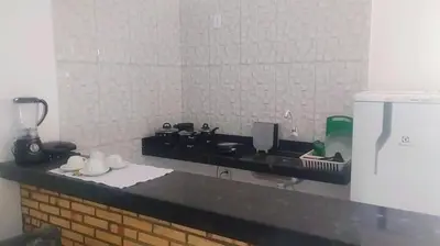 A cozinha ou kitchenette de Pousada Residencial Manzuá