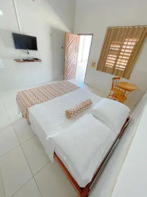 Uma cama ou camas num quarto em Pousada o Èdio