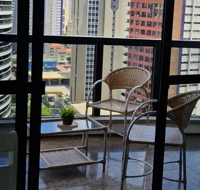 Uma área de estar em Flat Espetacular Vista Mar