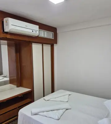 Uma cama ou camas num quarto em Flat Espetacular Vista Mar