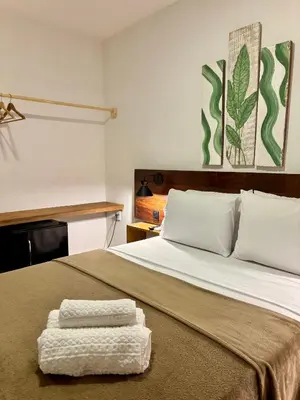 Uma cama ou camas num quarto em Quarto pra Casal, no centro de Jericoacoara!