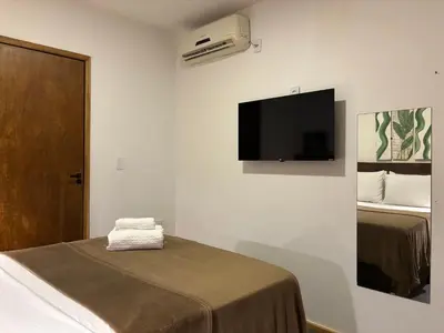 Uma cama ou camas num quarto em Quarto pra Casal, no centro de Jericoacoara!