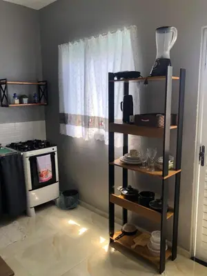 A cozinha ou kitchenette de Chalé Vista ao Mar gray