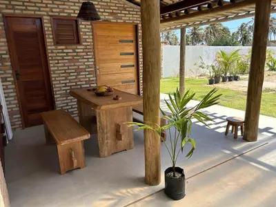 Um jardim no exterior de Chalé das Dunas Guajiru