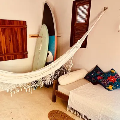 Uma cama ou camas num quarto em Casa Indigo Blue Jeri