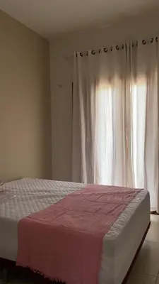 Uma cama ou camas num quarto em Chalés Dunas - Icaraí de Amontada