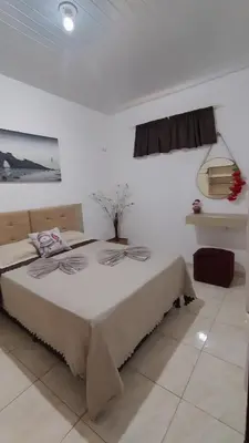 Uma cama ou camas num quarto em Casa ah temporal