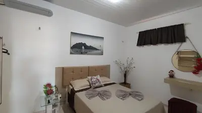 Uma cama ou camas num quarto em Casa ah temporal