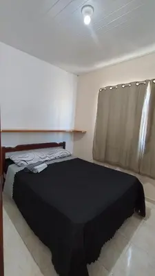 Uma cama ou camas num quarto em Casa ah temporal