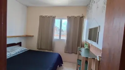 Uma cama ou camas num quarto em Casa ah temporal