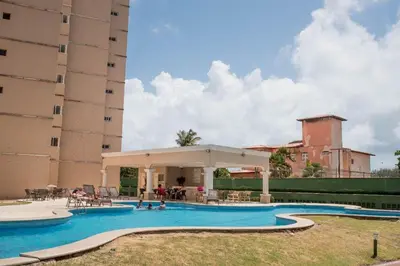 A piscina em ou perto de apartamento vista mar