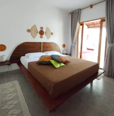 Uma cama ou camas num quarto em Casa Iruna