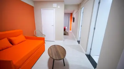 Uma área de estar em Davila Flat Hotel