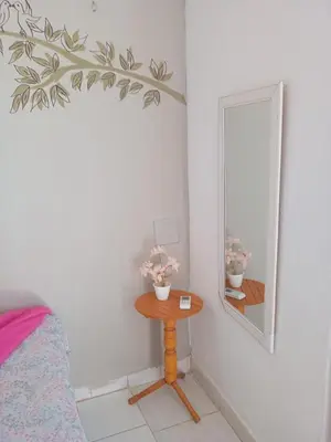 Uma cama ou camas num quarto em Recanto canoa da costureira Fran