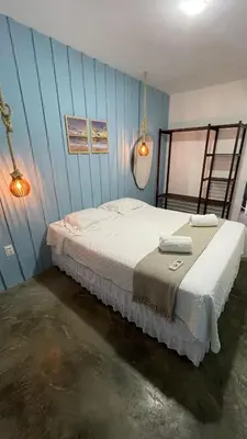 Uma cama ou camas num quarto em La Famiile