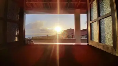 O nascer ou o pôr do sol visto a partir do apartamento