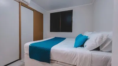 Uma cama ou camas num quarto em Praia de Iracema vista mar - Atlantic Ocean
