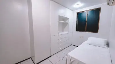 Uma cama ou camas num quarto em Praia de Iracema vista mar - Atlantic Ocean