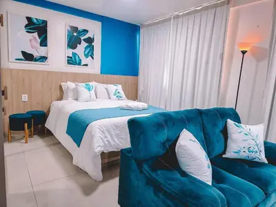 Uma cama ou camas num quarto em Studio compacto no Cocó - One Milenio